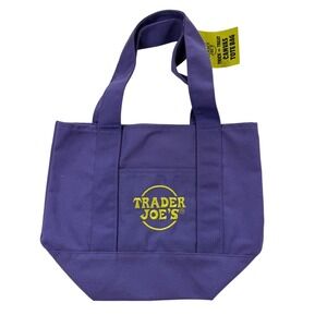 NWT Trader Joes Trick or Treat Canvas Tote Bag Purple Yellow logo